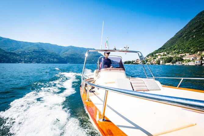 1H Private Cruise on a beautiful wooden speedboat on Lake Como - Villa Olmo and the seaplane hangar view from the water