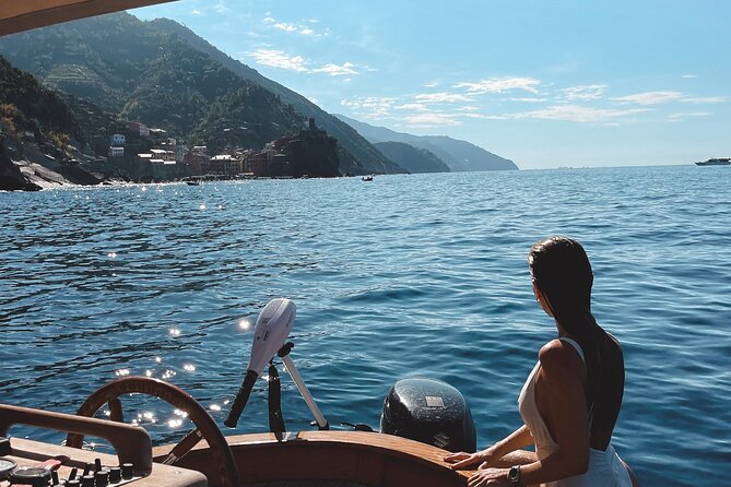 3 Hour shared Cinque Terre tour + Swim Stops at Secluded Beaches! - A cool escape: gozzo boat views of Cinque Terre from the water