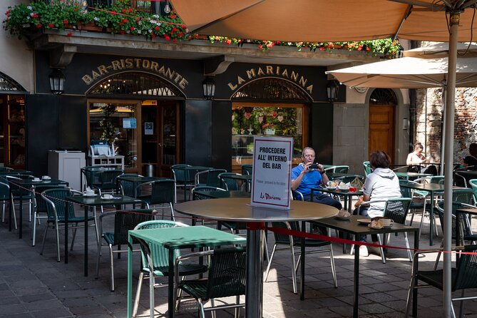 Bergamo: Full meal Food Tour with Local Delights by Do Eat Better - Stop 3: Piazza Vecchia and the polenta with lard and cheese that divides opinions