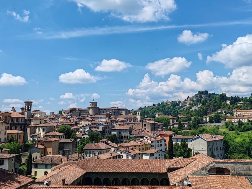 Bergamo: Upper Town Guided Tour with French-speaking Guide - Piazza Vecchia: where the civic heart still shows