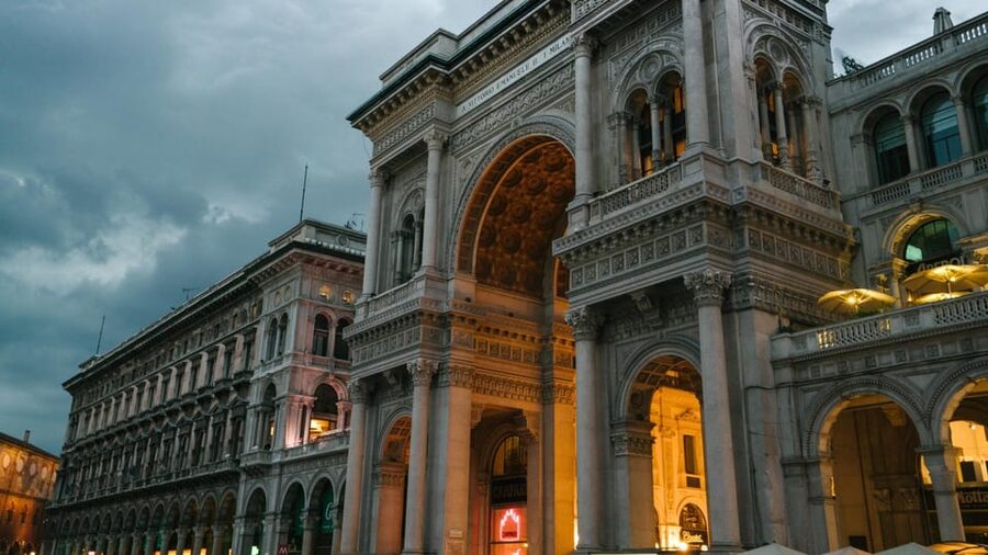 Best of Milan: Private Walking Tour with a Local - Galleria Vittorio Emanuele II: the glass-dome shopping arcade moment