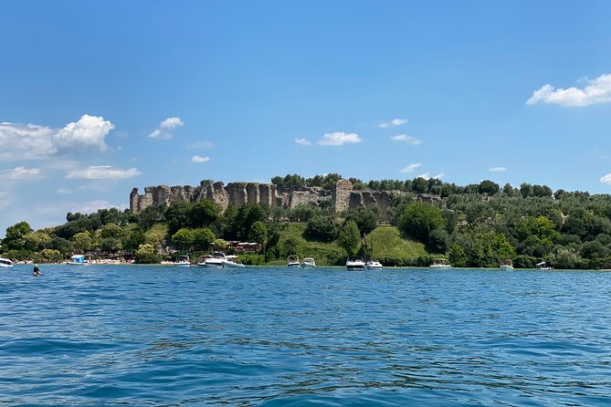 Castles boat tour with Bardolino wine tasting and nibbles - The ride itself: castles, spa sights, and Roman ruins from the water