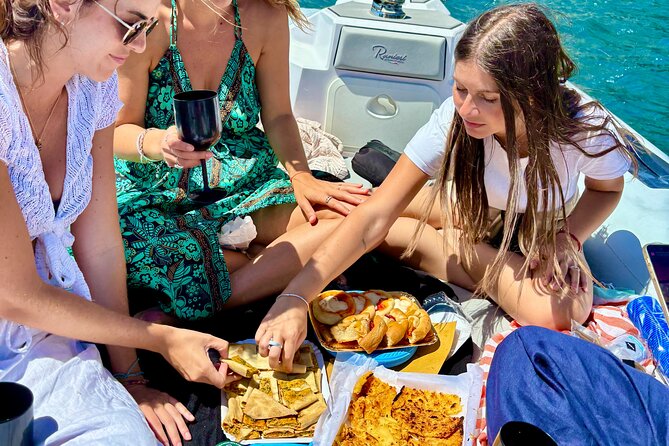 Cinque Terre wonders Full Day Boat Tour - Riomaggiore, Manarola, and Corniglia from the sea