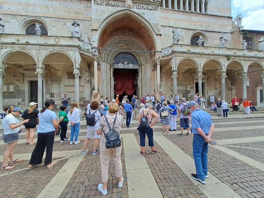 Cremona: City of art and music in Italian - 5. Baptistery and Torrazzo from the outside: the scale hits when you can’t miss it