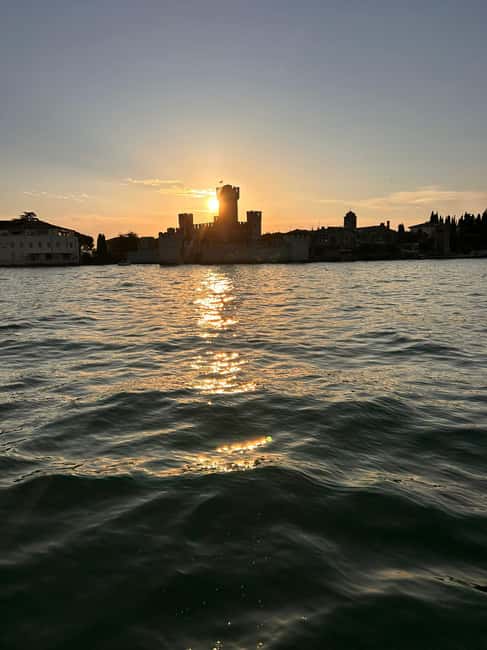 Desenzano del Garda: Sunset Boat Trip at Sunset with Drink - Getting There: Desenzano Harbor, Hotel Vittorio, and the Second Jetty