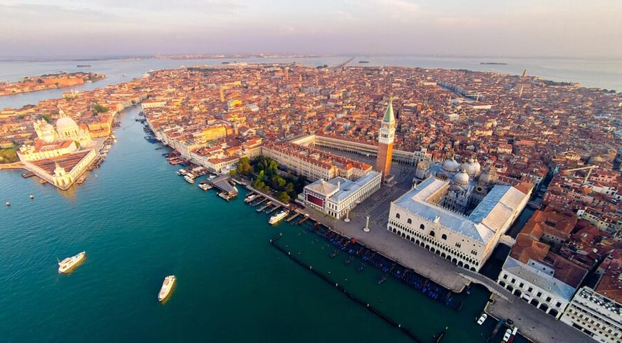From Milan: Venice City Highlights Guided Day Trip - Rialto Bridge over the Grand Canal, plus photo time