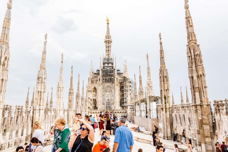 Milan Duomo Rooftops Tour + Optional Hop-on-Hop-off ticket - Where you meet and how the 1-hour timing works