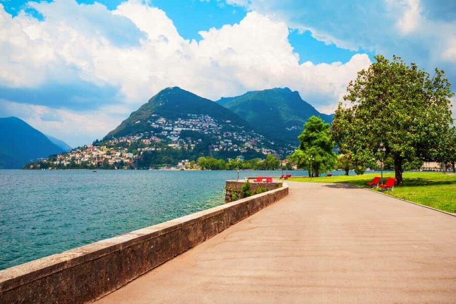 Milan:Lake Como, Lugano & Bellagio Day-Trip with Boat Cruise - Como on the clock: cathedral, Piazza Volta, and lake promenade views