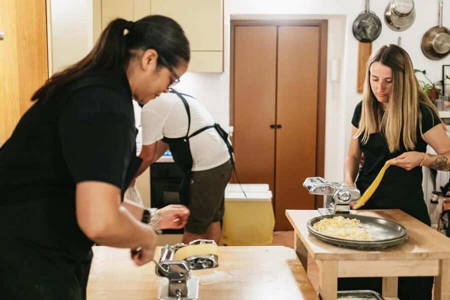 Milan: Pasta & Tiramisu Cooking Class with Premium Products - Wine-Backed Dinner: Family-Style Eating in a Real Home Setting