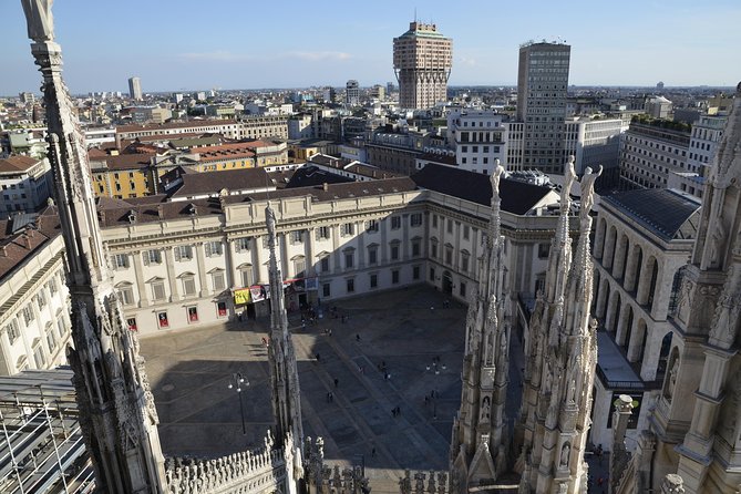 Milan Super Saver: Skip-the-line Duomo and Rooftop Tour - Stop 2: skip the cathedral line, then hunt for details inside Duomo di Milano