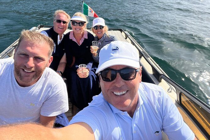 Private Boat Tour Como Wooden Classic Boat - Onboard Comfort, Drinks, and Cool-Weather Reality