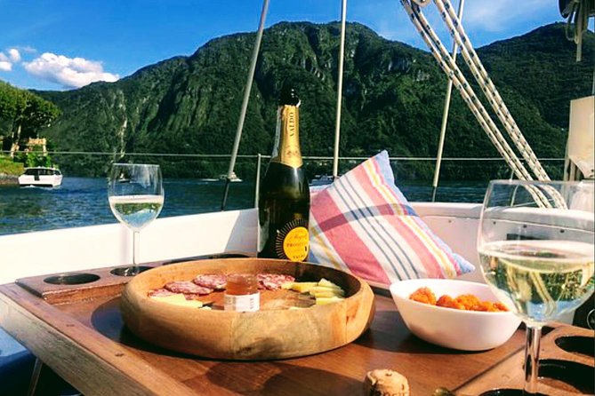 Sailing Experience on Lake Como with Private Skipper - Boat Comfort and Weather Prep: Blankets and Ponchos Matter