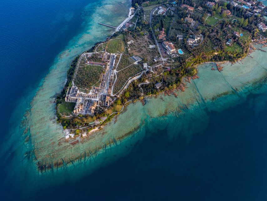 Sirmione: Scenic Afternoon Boat Cruise with Prosecco & Snack - Gardone Riviera sparkling wine, then sulfur springs and the drawbridge finale